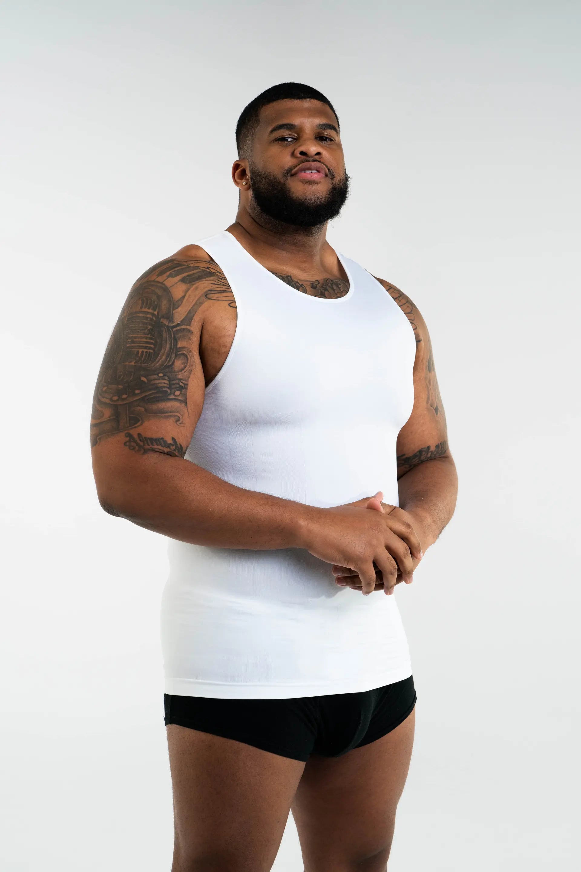 Best slimming shirts for layering under clothes?