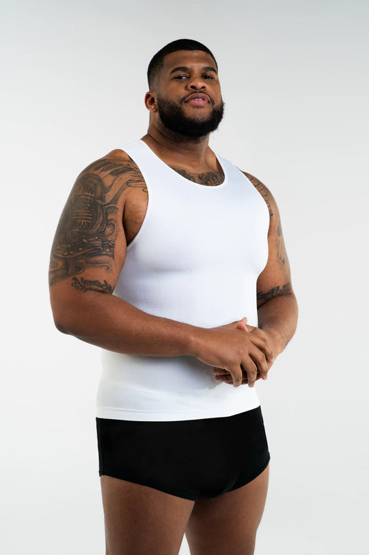 White Body Shaper Tank by Tusq Apparel displayed on mannequin, showcasing compression fabric and clean edges