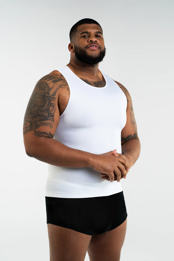 White Body Shaper Tank by Tusq Apparel displayed on mannequin, showcasing compression fabric and clean edges